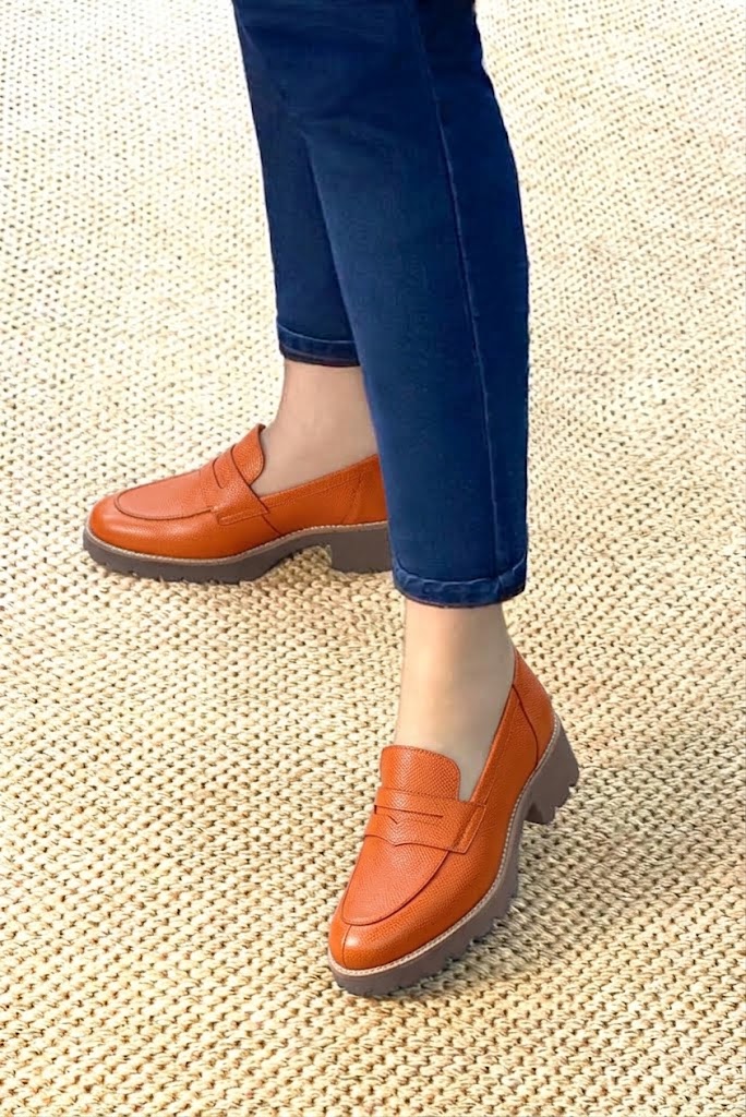 Women's terracotta lug-sole loafers with round toe and chunky rubber lug sole - Worn view